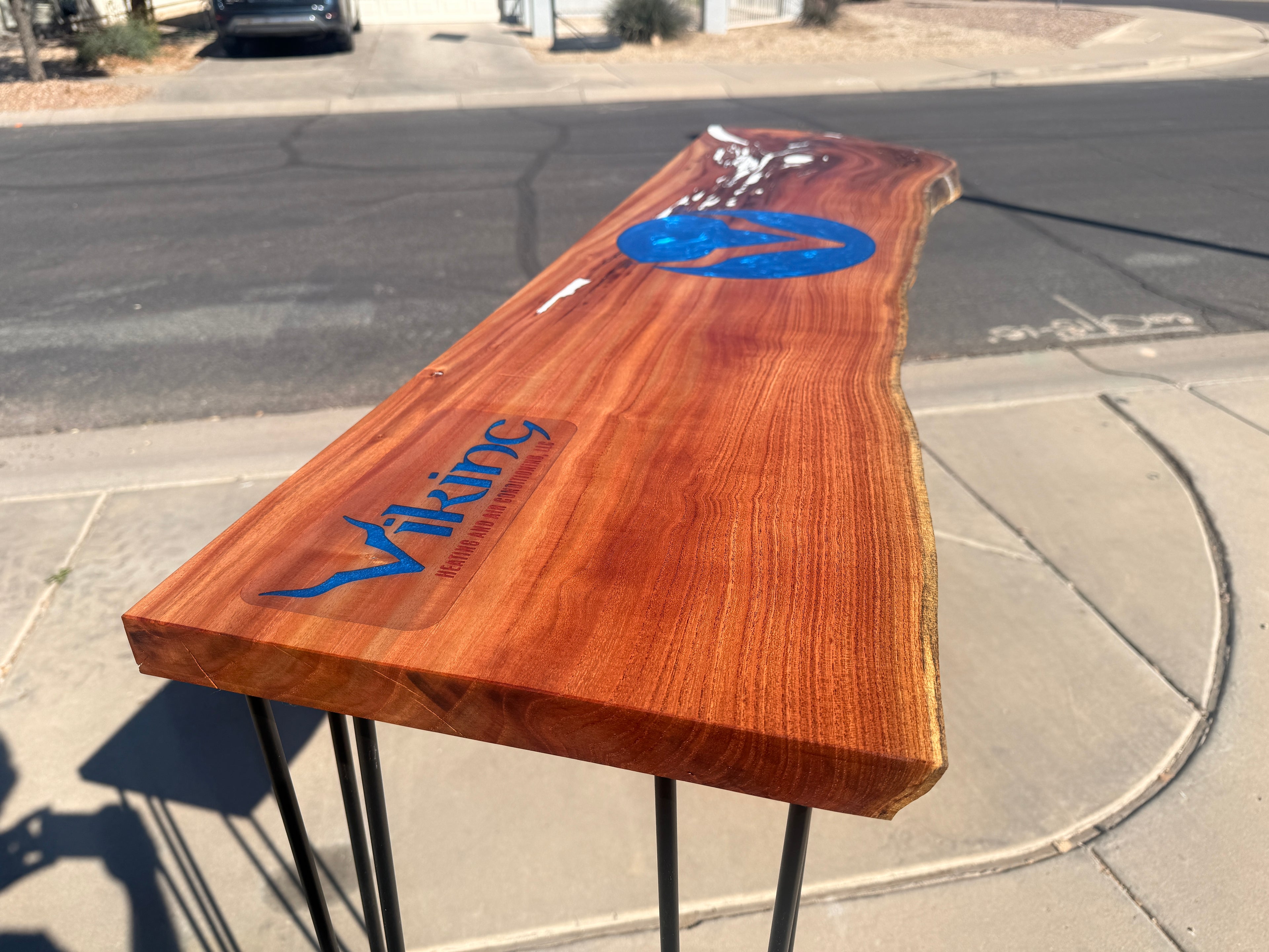 Wooden table with 'Viking' branding 